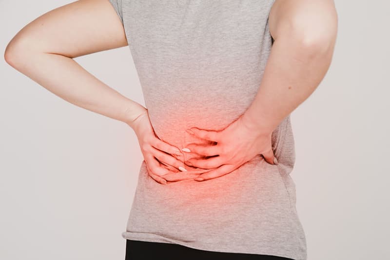 back pain due to brittle bones